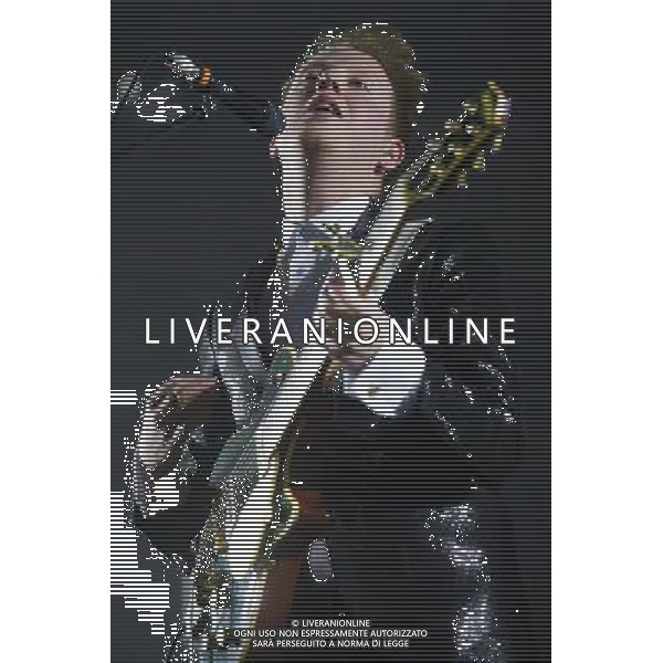 Alex Trimble of Northern Irish Indie rock band Two Door Cinema Club performs at their biggest show in London to date at The O2 Arena, London, England, UK on Friday 13th December. The band consists of Alex Trimble (lead vocals/guitar), Kevin Baird (bass) and Sam Halliday (lead guitar). ©PHOTOHSOT/AGENZIA ALDO LIVERANI SAS - ITALY ONLY - EDITORIAL USE ONLY