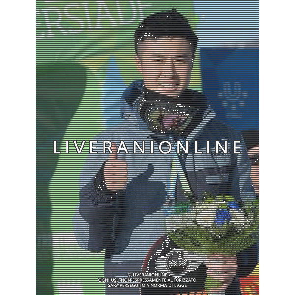 (131217) -- TRENTINO, Dec. 17, 2013 () -- Silver medal winner Hu Yi of China poses during the victory ceremony for the men\'s halfpipe of snowboard at the 26th Winter Universiade in Trentino, Italy, Dec. 17, 2013. (/He Changshan) @Photoshot/Ag. Aldo Liverani s.a.s.-Only Italy-Editorial Use Only