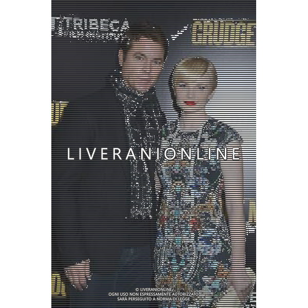 Mark Johnson and Elizabeth Olin attends the World Premiere of \'Grudge Match\' at the Ziegfeld Theatre in New Yok City on December 16, 2013. @Photoshot/Ag. Aldo Liverani s.a.s.-Only Italy-Editorial Use Only