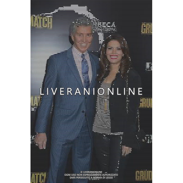 Michael Buffer and wife Christine Buffer attend the World Premiere of \'Grudge Match\' at the Ziegfeld Theatre in New Yok City on December 16, 2013. @Photoshot/Ag. Aldo Liverani s.a.s.-Only Italy-Editorial Use Only