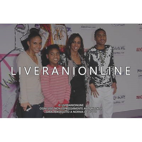 Holly Robinson Peete and children at \'Justin Bieber\'s Believe\' Premiere on December 18 2013 in Los Angeles, California. AG ALDO LIVERANI SAS ONLY ITALY
