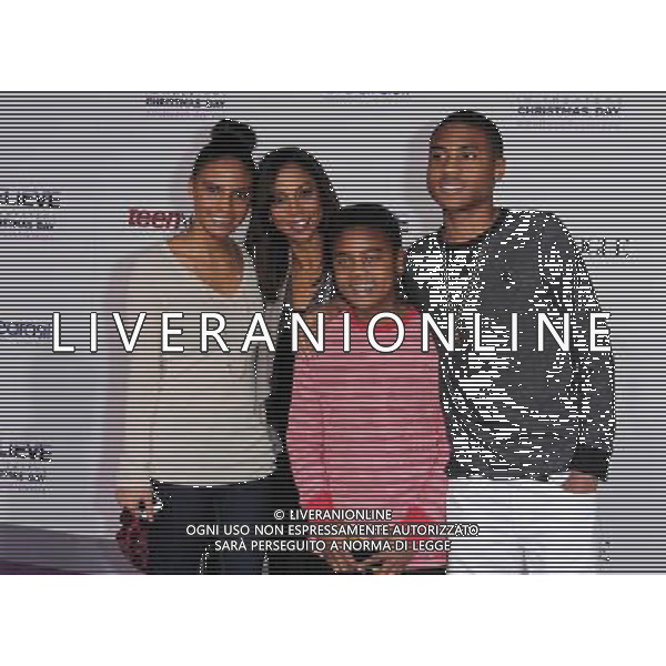 Holly Robinson Peete and children at \'Justin Bieber\'s Believe\' Premiere on December 18 2013 in Los Angeles, California. AG ALDO LIVERANI SAS ONLY ITALY