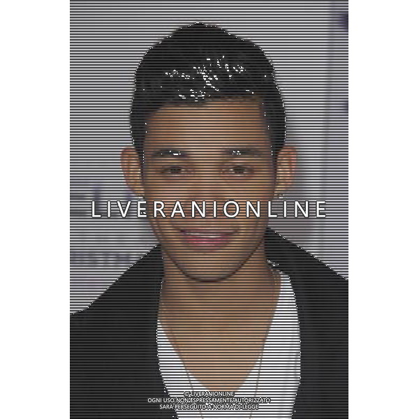 LOS ANGELES - DECEMBER 18: Roshon Fegan at \'Justin Bieber\'s Believe\' Premiere on December 18 2013 in Los Angeles, California. (Photo by Martin Sloan) AG ALDO LIVERANI SAS ONLY ITALY