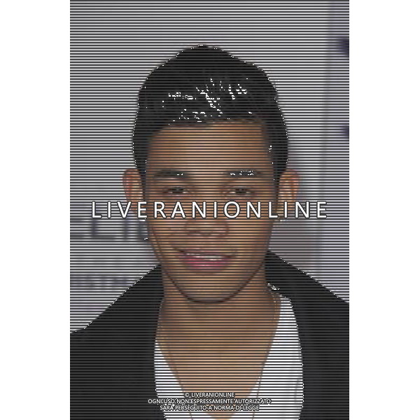 LOS ANGELES - DECEMBER 18: Roshon Fegan at \'Justin Bieber\'s Believe\' Premiere on December 18 2013 in Los Angeles, California. (Photo by Martin Sloan) AG ALDO LIVERANI SAS ONLY ITALY