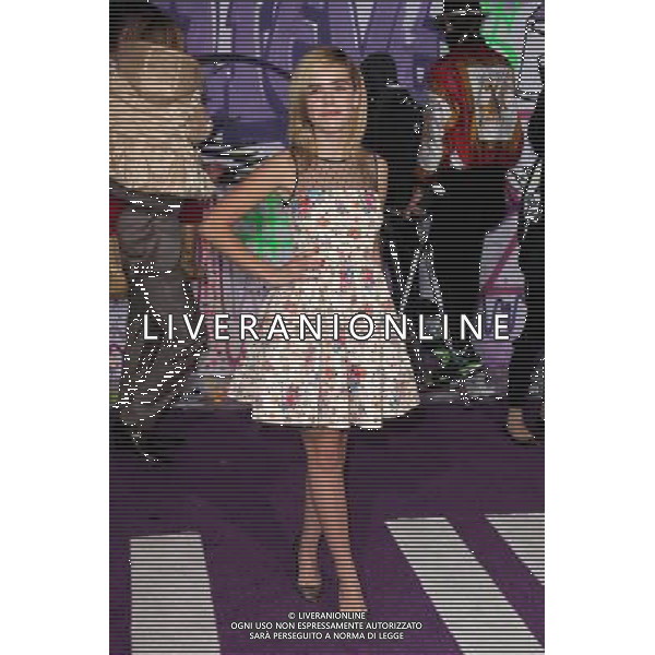 LOS ANGELES - DECEMBER 18: Kiernan Shipka at \'Justin Bieber\'s Believe\' Premiere on December 18 2013 in Los Angeles, California. (Photo by Martin Sloan) AG ALDO LIVERANI SAS ONLY ITALY