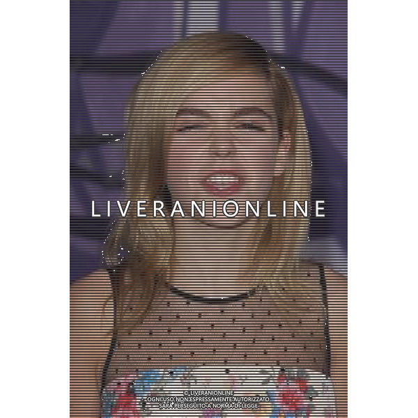 LOS ANGELES - DECEMBER 18: Kiernan Shipka at \'Justin Bieber\'s Believe\' Premiere on December 18 2013 in Los Angeles, California. (Photo by Martin Sloan) AG ALDO LIVERANI SAS ONLY ITALY