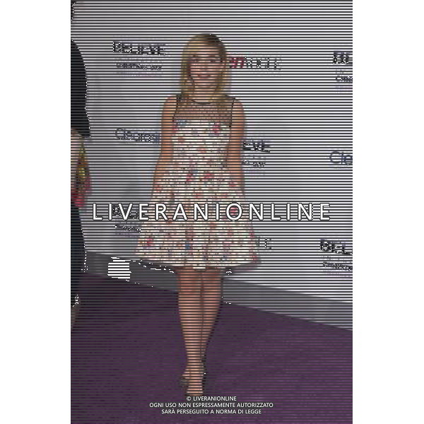 LOS ANGELES - DECEMBER 18: Kiernan Shipka at \'Justin Bieber\'s Believe\' Premiere on December 18 2013 in Los Angeles, California. (Photo by Martin Sloan) AG ALDO LIVERANI SAS ONLY ITALY