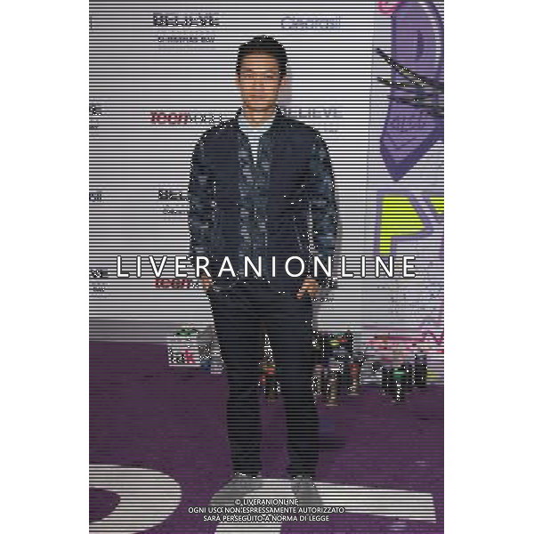 LOS ANGELES - DECEMBER 18: Harry Shum, Jr. at \'Justin Bieber\'s Believe\' Premiere on December 18 2013 in Los Angeles, California. (Photo by Martin Sloan) AG ALDO LIVERANI SAS ONLY ITALY