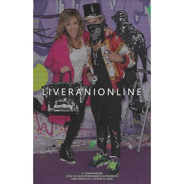 LOS ANGELES - DECEMBER 18: Sandra Taylor, Alec Monopoly at \'Justin Bieber\'s Believe\' Premiere on December 18 2013 in Los Angeles, California. (Photo by Martin Sloan) AG ALDO LIVERANI SAS ONLY ITALY