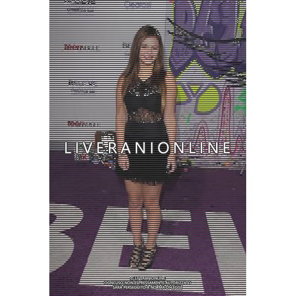 LOS ANGELES - DECEMBER 18: Jacquie Lee at \'Justin Bieber\'s Believe\' Premiere on December 18 2013 in Los Angeles, California. (Photo by Martin Sloan) AG ALDO LIVERANI SAS ONLY ITALY
