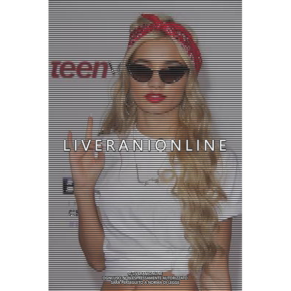 LOS ANGELES - DECEMBER 18: Pia Mia at \'Justin Bieber\'s Believe\' Premiere on December 18 2013 in Los Angeles, California. (Photo by Martin Sloan) AG ALDO LIVERANI SAS ONLY ITALY