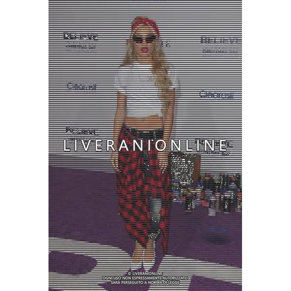 LOS ANGELES - DECEMBER 18: Pia Mia at \'Justin Bieber\'s Believe\' Premiere on December 18 2013 in Los Angeles, California. (Photo by Martin Sloan) AG ALDO LIVERANI SAS ONLY ITALY