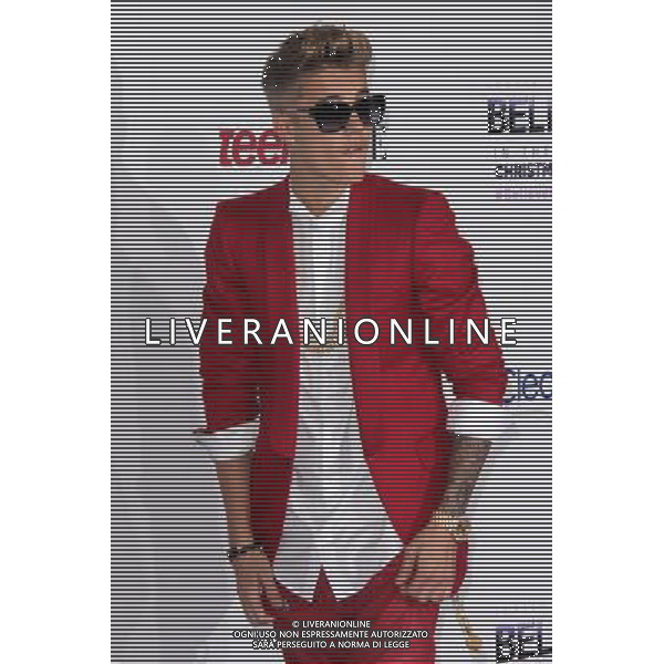 LOS ANGELES - DECEMBER 18: Justin Bieber at \'Justin Bieber\'s Believe\' Premiere on December 18 2013 in Los Angeles, California. (Photo by Martin Sloan) AG ALDO LIVERANI SAS ONLY ITALY