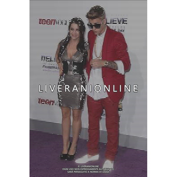 LOS ANGELES - DECEMBER 18: Pattie Mallette, Justin Bieber at \'Justin Bieber\'s Believe\' Premiere on December 18 2013 in Los Angeles, California. (Photo by Martin Sloan) AG ALDO LIVERANI SAS ONLY ITALY