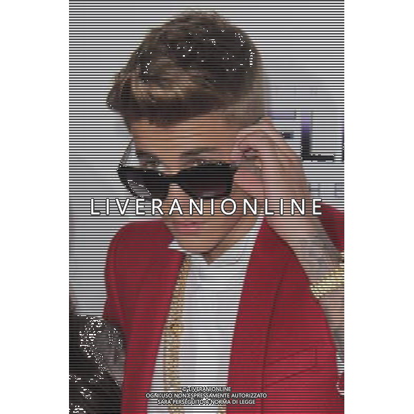 LOS ANGELES - DECEMBER 18: Justin Bieber at \'Justin Bieber\'s Believe\' Premiere on December 18 2013 in Los Angeles, California. (Photo by Martin Sloan) AG ALDO LIVERANI SAS ONLY ITALY