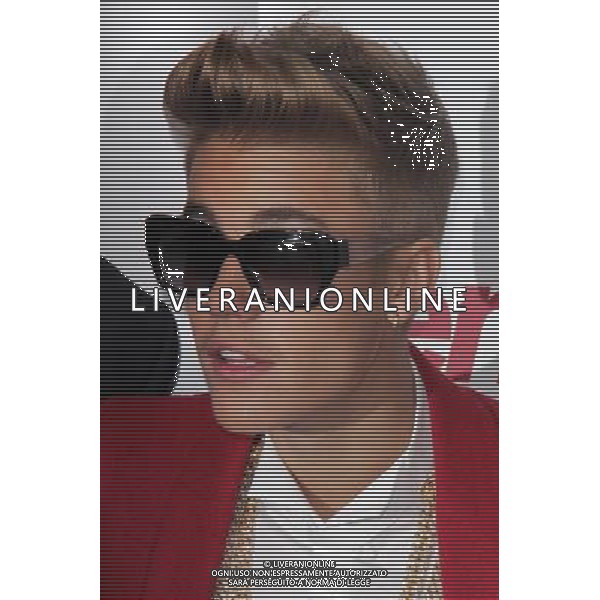 LOS ANGELES - DECEMBER 18: Justin Bieber at \'Justin Bieber\'s Believe\' Premiere on December 18 2013 in Los Angeles, California. (Photo by Martin Sloan) AG ALDO LIVERANI SAS ONLY ITALY