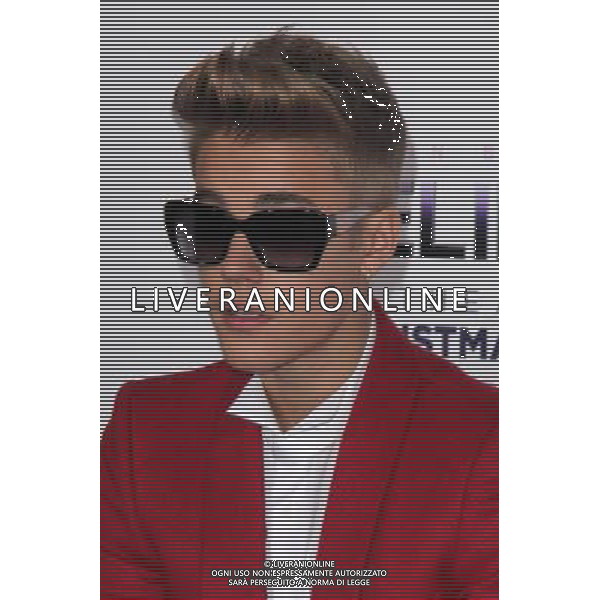 LOS ANGELES - DECEMBER 18: Justin Bieber at \'Justin Bieber\'s Believe\' Premiere on December 18 2013 in Los Angeles, California. (Photo by Martin Sloan) AG ALDO LIVERANI SAS ONLY ITALY