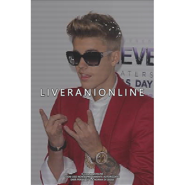 LOS ANGELES - DECEMBER 18: Justin Bieber at \'Justin Bieber\'s Believe\' Premiere on December 18 2013 in Los Angeles, California. (Photo by Martin Sloan) AG ALDO LIVERANI SAS ONLY ITALY