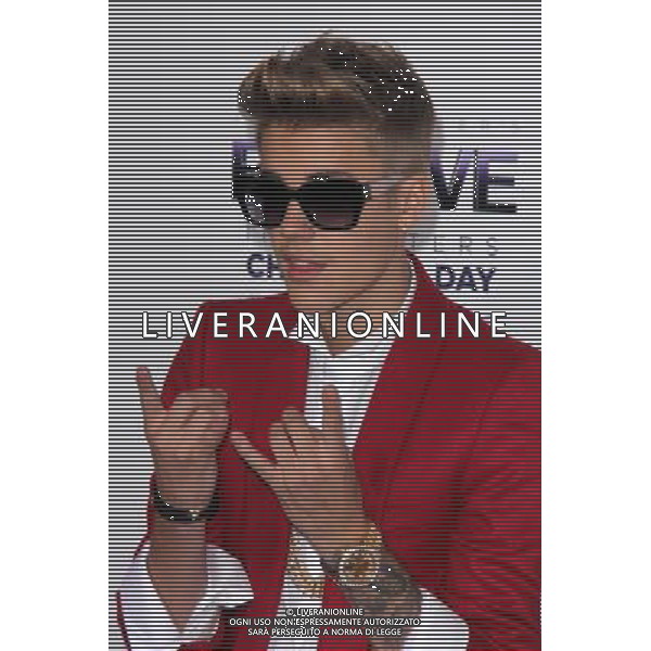 LOS ANGELES - DECEMBER 18: Justin Bieber at \'Justin Bieber\'s Believe\' Premiere on December 18 2013 in Los Angeles, California. (Photo by Martin Sloan) AG ALDO LIVERANI SAS ONLY ITALY