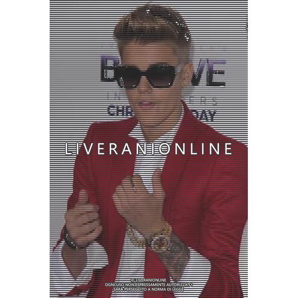 LOS ANGELES - DECEMBER 18: Justin Bieber at \'Justin Bieber\'s Believe\' Premiere on December 18 2013 in Los Angeles, California. (Photo by Martin Sloan) AG ALDO LIVERANI SAS ONLY ITALY