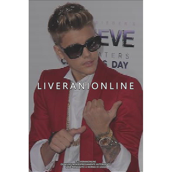 LOS ANGELES - DECEMBER 18: Justin Bieber at \'Justin Bieber\'s Believe\' Premiere on December 18 2013 in Los Angeles, California. (Photo by Martin Sloan) AG ALDO LIVERANI SAS ONLY ITALY