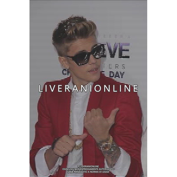 LOS ANGELES - DECEMBER 18: Justin Bieber at \'Justin Bieber\'s Believe\' Premiere on December 18 2013 in Los Angeles, California. (Photo by Martin Sloan) AG ALDO LIVERANI SAS ONLY ITALY