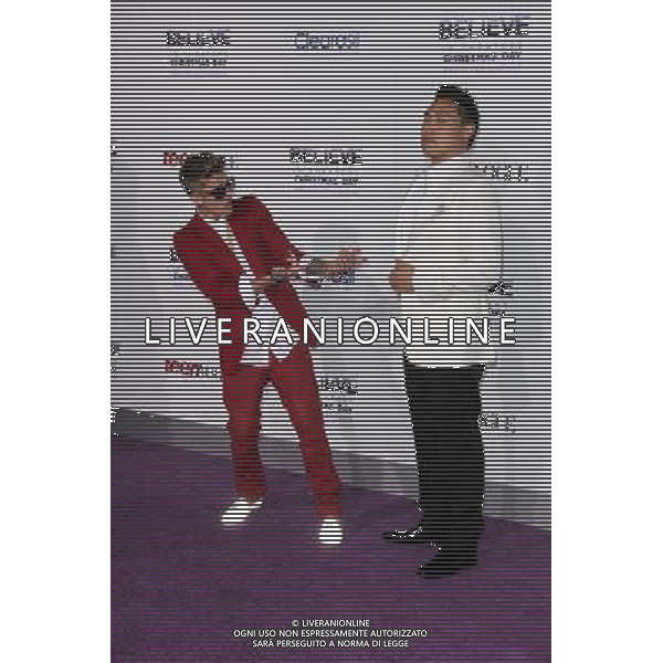LOS ANGELES - DECEMBER 18: Justin Bieber, Jon M. Chu at \'Justin Bieber\'s Believe\' Premiere on December 18 2013 in Los Angeles, California. (Photo by Martin Sloan) AG ALDO LIVERANI SAS ONLY ITALY