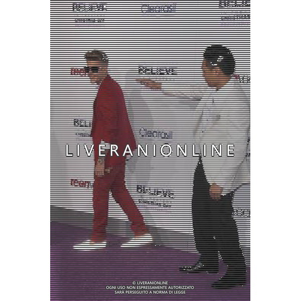 LOS ANGELES - DECEMBER 18: Justin Bieber, Jon M. Chu at \'Justin Bieber\'s Believe\' Premiere on December 18 2013 in Los Angeles, California. (Photo by Martin Sloan) AG ALDO LIVERANI SAS ONLY ITALY