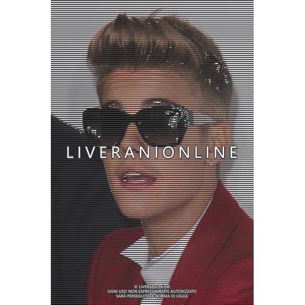 LOS ANGELES - DECEMBER 18: Justin Bieber at \'Justin Bieber\'s Believe\' Premiere on December 18 2013 in Los Angeles, California. (Photo by Martin Sloan) AG ALDO LIVERANI SAS ONLY ITALY