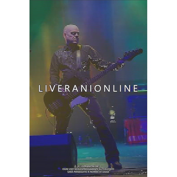 Bassist Craig Adams of Gothic rock band The Mission performs at a co-headline show with Fields Of The Nephilim at Brixton Academy, London, England, UK on 18th December 2013. The band consists of Wayne Hussey and Craig Adams (bass), Simon Hinkler (guitar) and Mike Kelly (drums). AG ALDO LIVERANI SAS ONLY ITALY