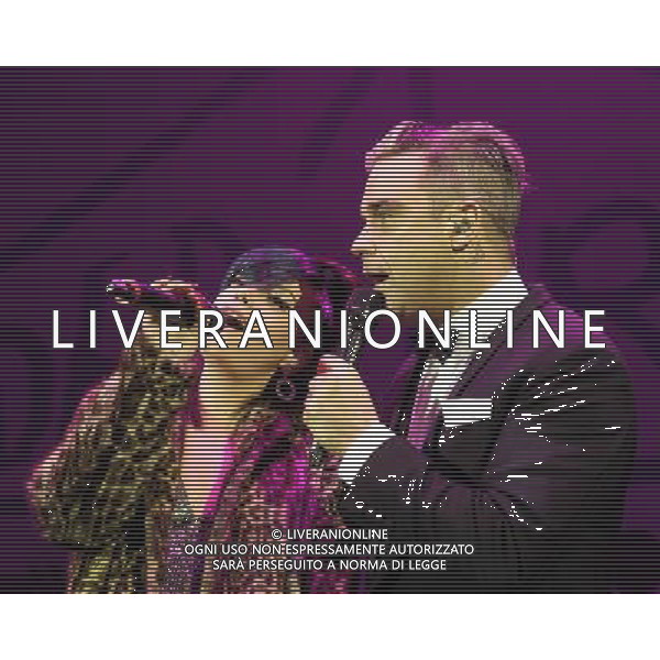 Robbie Williams and Lilly Allen plays the Under One Roof Charity Concert on 19/12/2013 at Hammersmith Eventim Apollo, London. Persons pictured: Robbie Williams, Lilly Allen. ©PHOTOHSOT/AGENZIA ALDO LIVERANI SAS - ITALY ONLY - EDITORIAL USE ONLY