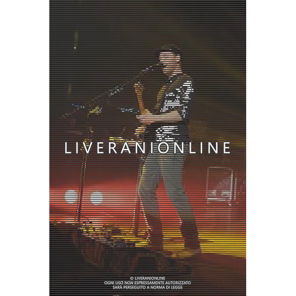 Coldplay play the Under One Roof Charity Concert on 19/12/2013 at Hammersmith Eventim Apollo, London. The show will raise funds for Kids Company, which works with vulnerable children and young people in London and Bristol. Persons pictured: Jonny Buckland. ©PHOTOHSOT/AGENZIA ALDO LIVERANI SAS - ITALY ONLY - EDITORIAL USE ONLY