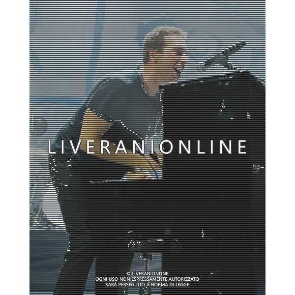 Coldplay play the Under One Roof Charity Concert on 19/12/2013 at Hammersmith Eventim Apollo, London. The show will raise funds for Kids Company, which works with vulnerable children and young people in London and Bristol. Persons pictured: Chris Martin. ©PHOTOHSOT/AGENZIA ALDO LIVERANI SAS - ITALY ONLY - EDITORIAL USE ONLY