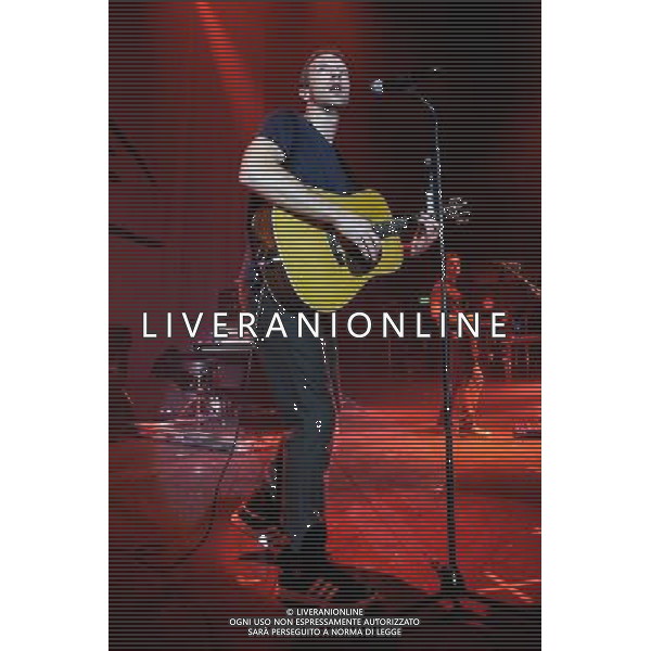 Coldplay play the Under One Roof Charity Concert on 19/12/2013 at Hammersmith Eventim Apollo, London. The show will raise funds for Kids Company, which works with vulnerable children and young people in London and Bristol. Persons pictured: Chris Martin. ©PHOTOHSOT/AGENZIA ALDO LIVERANI SAS - ITALY ONLY - EDITORIAL USE ONLY