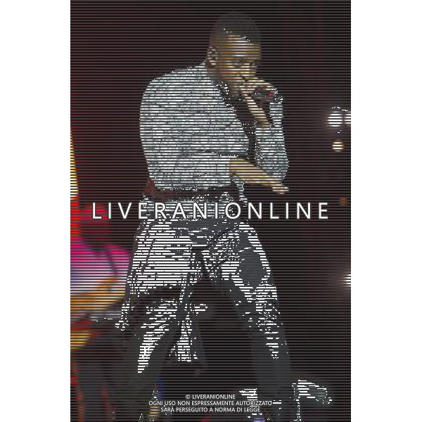 Oritse Williams of JLS performing at the first of three shows at The O2 Arena, London, England, UK on 21st December 2013 as part of the band\'s farewell tour. The boyband consists of JB Gill, Marvin Humes, Aston Merrygold and OritsÌ© Williams. ©PHOTOSHOT/AGENZIA ALDO LIVERANI SAS - ITALY ONLY - EDITORIAL USE ONLY