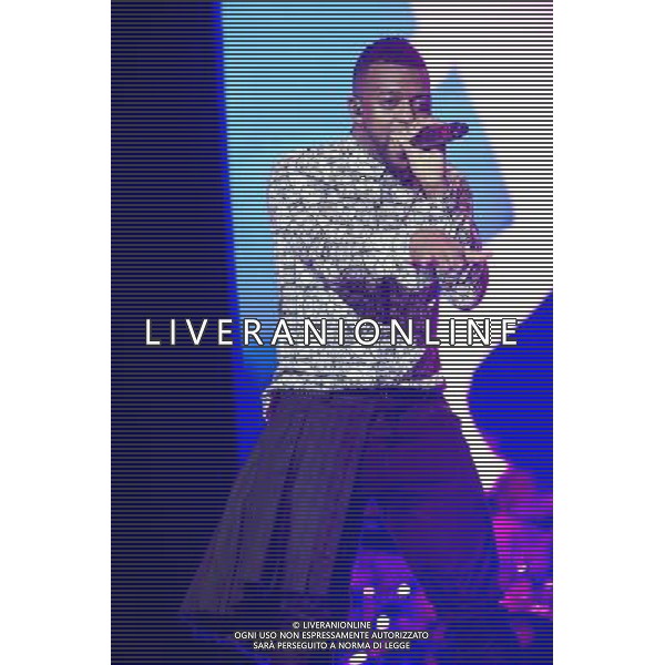 Oritse Williams of JLS performing at the first of three shows at The O2 Arena, London, England, UK on 21st December 2013 as part of the band\'s farewell tour. The boyband consists of JB Gill, Marvin Humes, Aston Merrygold and OritsÌ© Williams. ©PHOTOSHOT/AGENZIA ALDO LIVERANI SAS - ITALY ONLY - EDITORIAL USE ONLY