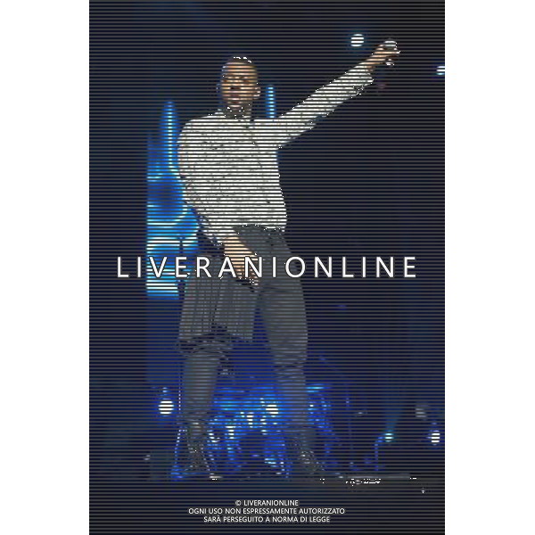 Oritse Williams of JLS performing at the first of three shows at The O2 Arena, London, England, UK on 21st December 2013 as part of the band\'s farewell tour. The boyband consists of JB Gill, Marvin Humes, Aston Merrygold and OritsÌ© Williams. ©PHOTOSHOT/AGENZIA ALDO LIVERANI SAS - ITALY ONLY - EDITORIAL USE ONLY