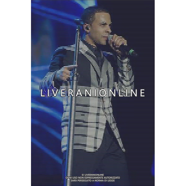 Marvin Humes of JLS performing at the first of three shows at The O2 Arena, London, England, UK on 21st December 2013 as part of the band\'s farewell tour. The boyband consists of JB Gill, Marvin Humes, Aston Merrygold and OritsÌ© Williams. ©PHOTOSHOT/AGENZIA ALDO LIVERANI SAS - ITALY ONLY - EDITORIAL USE ONLY
