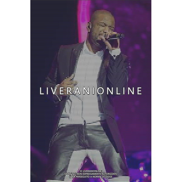 JB Gill of JLS performing at the first of three shows at The O2 Arena, London, England, UK on 21st December 2013 as part of the band\'s farewell tour. The boyband consists of JB Gill, Marvin Humes, Aston Merrygold and OritsÌ© Williams. ©PHOTOSHOT/AGENZIA ALDO LIVERANI SAS - ITALY ONLY - EDITORIAL USE ONLY