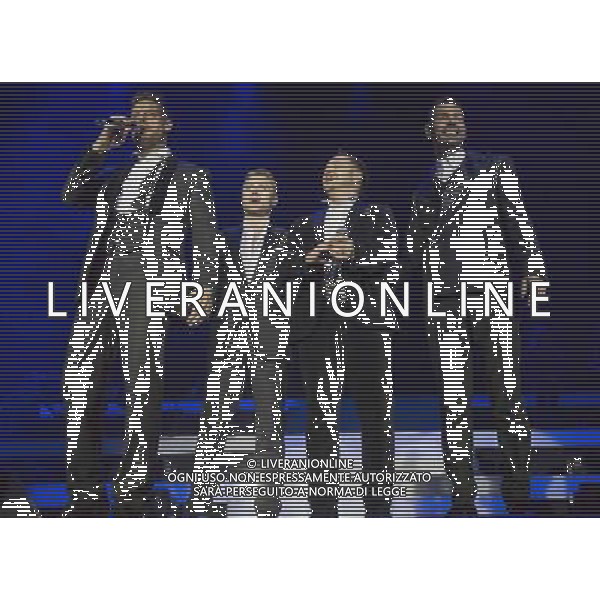 Irish boy band Boyzone (Keith Duffy, Mikey Graham, Ronan Keating, and Shane Lynch) perform at Manchester Arena on the last night of their BZ20 tour, 22nd December 2013. AG ALDO LIVERANI SAS ONLY ITALY