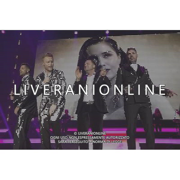 Irish boy band Boyzone (Keith Duffy, Mikey Graham, Ronan Keating, and Shane Lynch) perform at Manchester Arena on the last night of their BZ20 tour, 22nd December 2013. AG ALDO LIVERANI SAS ONLY ITALY