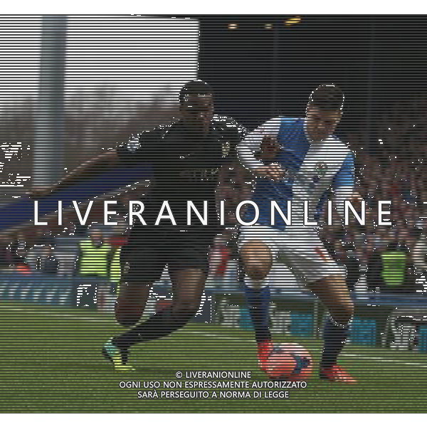 DEDRYCK BOYATA \' BEN MARSHALL BLACKBURN ROVERS V MANCHESTER CITY BLACKBURN ROVERS V MANCHESTER CITY BUDWEISER FA CUP 3RD ROUND EWOOD PARK, BLACKBURN, ENGLAND 04 January 2014 GAT77263 WARNING! This Photograph May Only Be Used For Newspaper And/Or Magazine Editorial Purposes. May Not Be Used For Publications Involving 1 player, 1 Club Or 1 Competition Without Written Authorisation From Football DataCo Ltd. For Any Queries, Please Contact Football DataCo Ltd on +44 (0) 207 864 9121