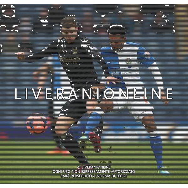 EDIN DZEKO \' LEE WILLIAMSON BLACKBURN ROVERS V MANCHESTER CITY BLACKBURN ROVERS V MANCHESTER CITY BUDWEISER FA CUP 3RD ROUND EWOOD PARK, BLACKBURN, ENGLAND 04 January 2014 GAT77242 WARNING! This Photograph May Only Be Used For Newspaper And/Or Magazine Editorial Purposes. May Not Be Used For Publications Involving 1 player, 1 Club Or 1 Competition Without Written Authorisation From Football DataCo Ltd. For Any Queries, Please Contact Football DataCo Ltd on +44 (0) 207 864 9121