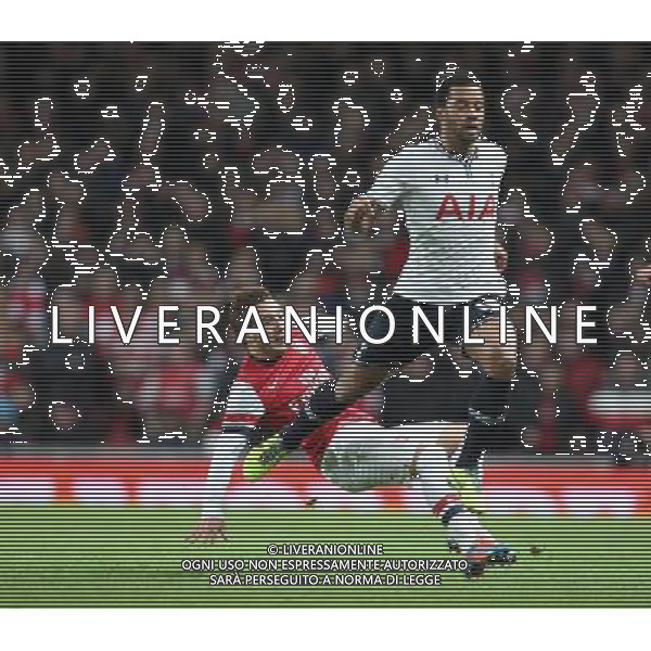 Arsenal\'s Santi Cazorla tackles Tottenham Hotspur\'s Mousa Dembele Photo by Kieran Galvin/CameraSport Football - FA Challenge Cup Third Round - Arsenal v Tottenham Hotspur - Saturday 4th January 2014 - Emirates Stadium - London © CameraSport - 43 Linden Ave. Countesthorpe. Leicester. England. LE8 5PG - Tel: +44 (0) 116 277 4147 - admin@camerasport.com - www.camerasport.com AG ALDO LIVERANI SAS ONLY ITALY