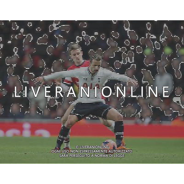 Tottenham Hotspur\'s Roberto Soldado holds of Arsenal\'s Nacho Monreal Photo by Kieran Galvin/CameraSport Football - FA Challenge Cup Third Round - Arsenal v Tottenham Hotspur - Saturday 4th January 2014 - Emirates Stadium - London © CameraSport - 43 Linden Ave. Countesthorpe. Leicester. England. LE8 5PG - Tel: +44 (0) 116 277 4147 - admin@camerasport.com - www.camerasport.com AG ALDO LIVERANI SAS ONLY ITALY