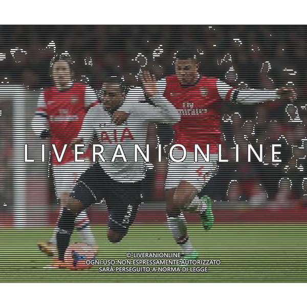 Tottenham Hotspur\'s Danny Rose despite the attentions of Arsenal\'s Serge Gnabry Photo by Kieran Galvin/CameraSport Football - FA Challenge Cup Third Round - Arsenal v Tottenham Hotspur - Saturday 4th January 2014 - Emirates Stadium - London © CameraSport - 43 Linden Ave. Countesthorpe. Leicester. England. LE8 5PG - Tel: +44 (0) 116 277 4147 - admin@camerasport.com - www.camerasport.com AG ALDO LIVERANI SAS ONLY ITALY
