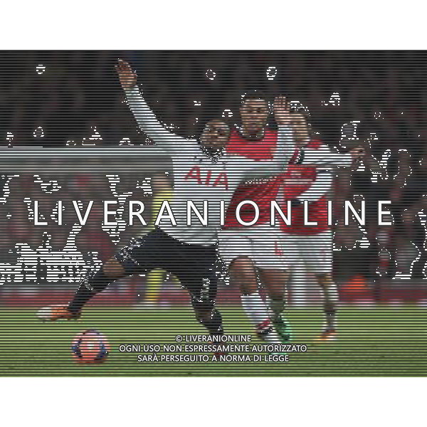 Tottenham Hotspur\'s Danny Rose despite the attentions of Arsenal\'s Serge Gnabry Photo by Kieran Galvin/CameraSport Football - FA Challenge Cup Third Round - Arsenal v Tottenham Hotspur - Saturday 4th January 2014 - Emirates Stadium - London © CameraSport - 43 Linden Ave. Countesthorpe. Leicester. England. LE8 5PG - Tel: +44 (0) 116 277 4147 - admin@camerasport.com - www.camerasport.com AG ALDO LIVERANI SAS ONLY ITALY