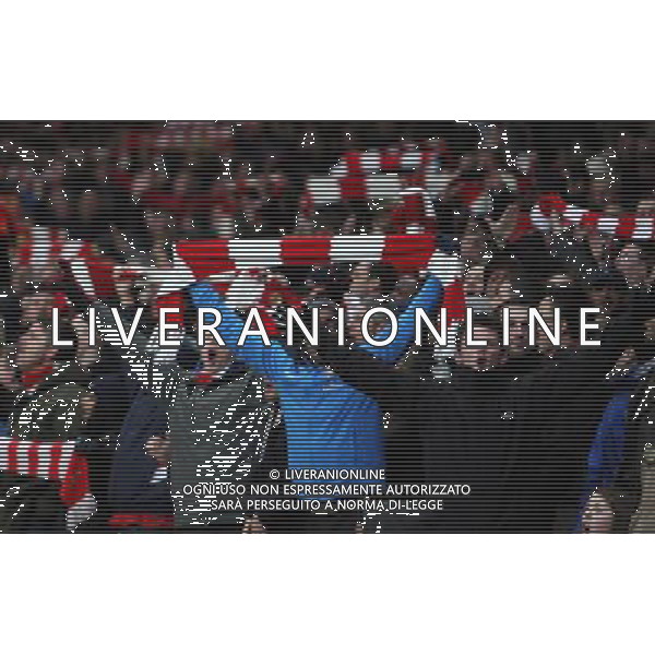 Arsenal\'s Fans celebrates they win Photo by Kieran Galvin/CameraSport Football - FA Challenge Cup Third Round - Arsenal v Tottenham Hotspur - Saturday 4th January 2014 - Emirates Stadium - London © CameraSport - 43 Linden Ave. Countesthorpe. Leicester. England. LE8 5PG - Tel: +44 (0) 116 277 4147 - admin@camerasport.com - www.camerasport.com AG ALDO LIVERANI SAS ONLY ITALY