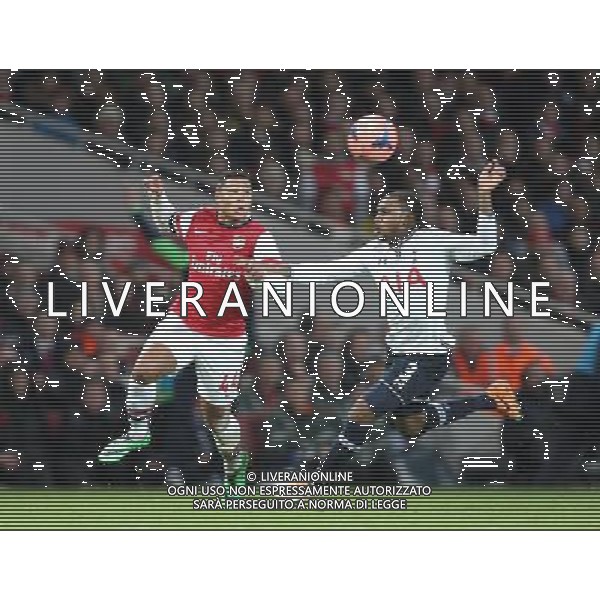 Arsenal\'s Serge Gnabrydespite the attentions of Tottenham Hotspur\'s Danny Rose Photo by Kieran Galvin / Camerasport Football - FA Challenge Cup Third Round - Arsenal v Tottenham Hotspur - Saturday 4th January 2014 - Emirates Stadium - London © CameraSport - 43 Linden Ave. Countesthorpe. Leicester. England. LE8 5PG - Tel: +44 (0) 116 277 4147 - admin@camerasport.com - www.camerasport.com AG ALDO LIVERANI SAS ONLY ITALY