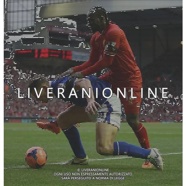 JAMES TARKOWSKI \' VICTOR MOSES LIVERPOOL V OLDHAM ATHLETIC LIVERPOOL V OLDHAM ATHLETIC BUDWEISER FA CUP 3RD ROUND ANFIELD, LIVERPOOL, ENGLAND 05 January 2014 GAT77328 WARNING! This Photograph May Only Be Used For Newspaper And/Or Magazine Editorial Purposes. May Not Be Used For Publications Involving 1 player, 1 Club Or 1 Competition Without Written Authorisation From Football DataCo Ltd. For Any Queries, Please Contact Football DataCo Ltd on +44 (0) 207 864 9121 AG ALDO LIVERANI SAS ONLY ITALY